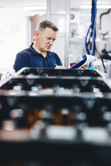 Man preparing craft beer from brewery for shipment.