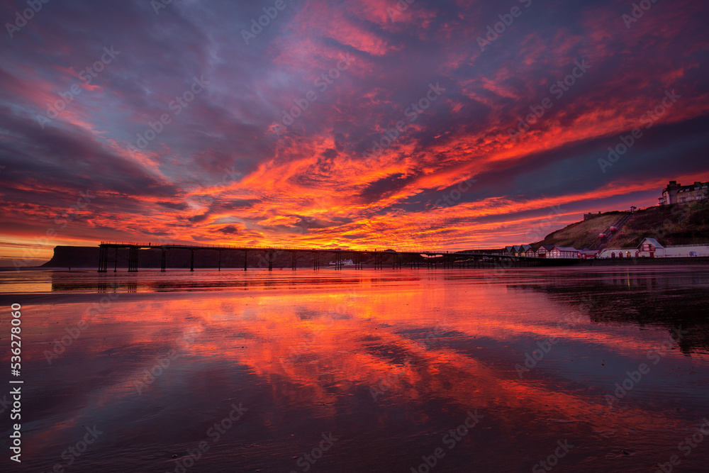 Wall mural Sunrise over Saltburn Pier and beach