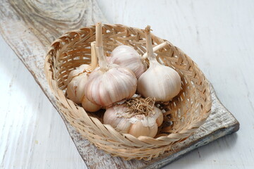 Garlic Cloves and Bulb on white background 