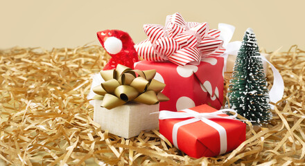 Christmas gift box and decoration on glitter gold paper background