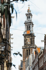 Fototapeta na wymiar Westerkerk in Amsterdam with golden light Netherlands Holland