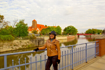 portrait of a happy woman in wroclaw city, poland
