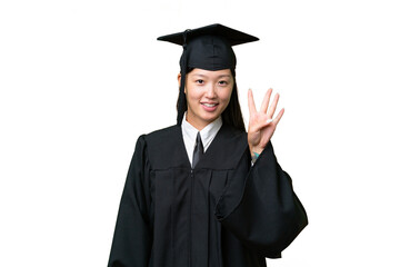 Young university graduate Asian woman over isolated background happy and counting four with fingers