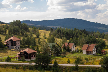 Fototapeta na wymiar Local villages and unique architecture in the rural area of Zlatibor mountain, Serbia 07.09.2022