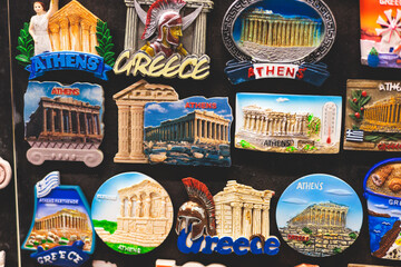 View of traditional tourist souvenirs and gifts from Athens, Attica, Greece with fridge magnets...