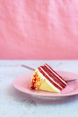 Sliced Homemade Red Velvet Layer Cake with Cream Cheese Frosting