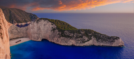 Panoramic view of Navagio beach with the shipwreck in Zakynthos at  sunset