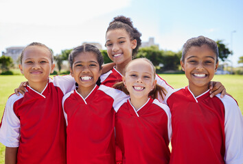 Team, smile and happy children football girl players ready for fitness, teamwork and exercise on an outdoor field. Portrait of a kids sport group for sport training, workout and game collaboration