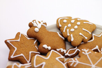 Christmas gingerbread handmade on white background.