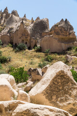 Landscape of the typical houses of Cappadocia integrated in the rocks creating incredible rock formations.