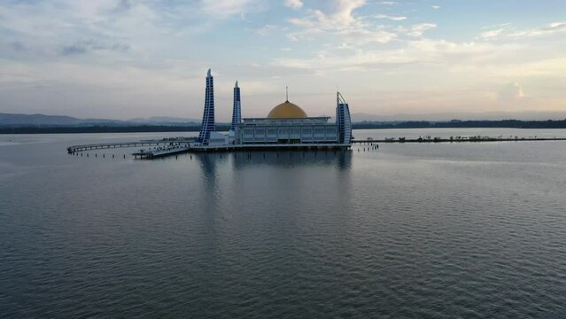 Beautiful aerial view of Al Alam floating Great Mosque Kendari. Shot in 4k resolution from a drone flying zoom
