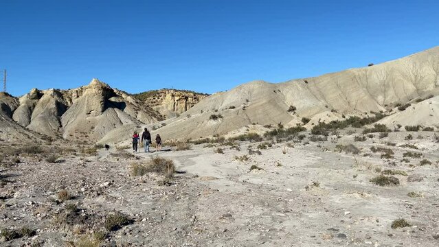 family walking in Tabernas desert- Andalusia, Spain