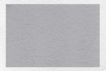 Fototapeta premium Texture of craft gray color paper background with white border, macro. Structure of vintage dense kraft grey cardboard