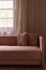 Fototapeta premium A modern, stylish and bright living room. Stylish scandinavian living room with design mint sofa