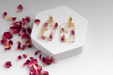 Heart-shaped earrings made of resin, handmade jewelry.