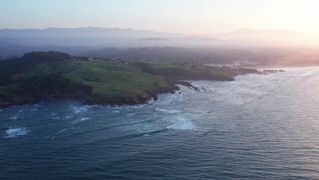 Aerial View Of Green Mountains In Foggy Majestic Scenery, Comillas Coast, Spain