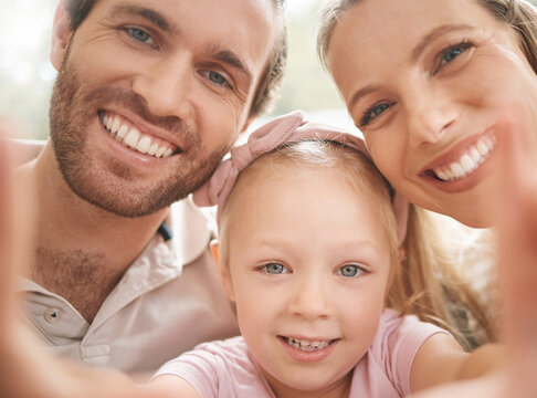 Love, parents and family selfie with child for cheerful and positive bonding moment together. Happy mother and father smile for photograph memory with young and cute daughter in Canada.