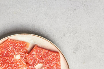 Detox, diet picture of healthy food. Grapefruit on a plate. Natural beauty medicine concept.