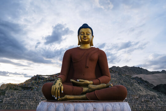  Buddha statue high in the mountains in city of Leh, Ladakh, India
