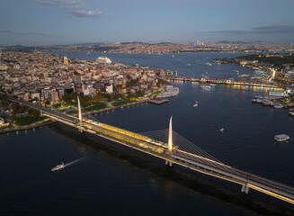 Fototapeta premium Halic Metro Bridge in the Sunset Drone Photo, Galata Beyoglu, Istanbul Turkey