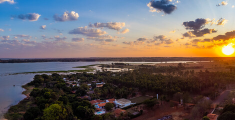 Naklejka premium sunset on the riverbank drone
