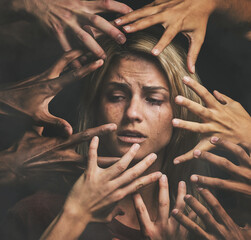 Many hands, face and abuse with a woman victim feeling fear, alone or crying in studio on a dark...