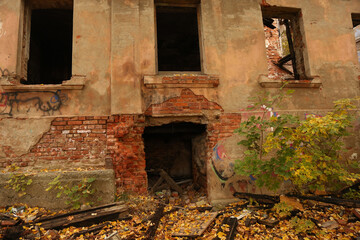 Abandoned building at autumn time
