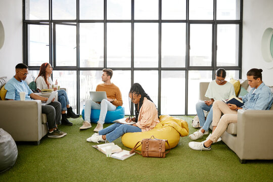 Education, studying and students meeting for project collaboration, teamwork or research planning in university workspace. Design, creativity and relax gen z group of people in college study team
