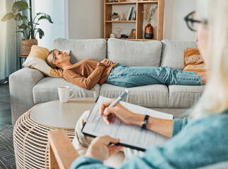 Obraz na płótnie Canvas Relax, psychology and therapist with woman patient struggling with depression resting on sofa. Professional psychologist analysis notes for consultation to help emotional mental health client.