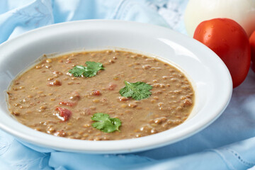 Lentil soup in bowl, healthy homemade food.