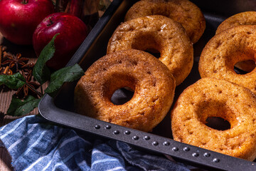 Traditional tasty ready to eat apple cider donuts. Homemade baked apple cinnamon donuts with apple...