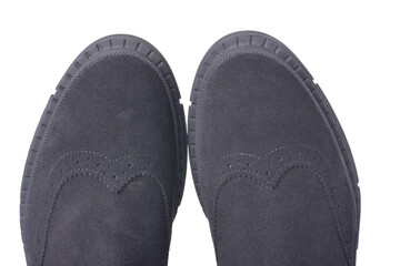 The toe of women's boots made of black suede. Isolated on a white background, close-up