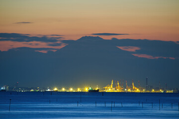 Night view of Yokohama Port and Mt. Fuji to see over Tokyo Bay from the Egawa coast, Chiba, Japan