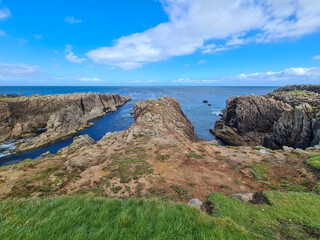 The cliffs close to the Lighthouse on Tory Island, County Donegal, Republic of Ireland © Lukassek