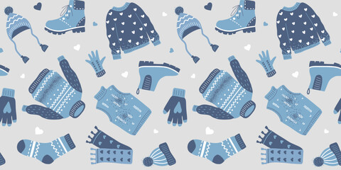 Seamless pattern with warm winter clothes. Knitted sweater, hat, gloves, boots, scarf and socks