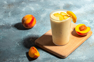 peach drink smoothies. protein shake with peach milkshake, Summer breakfast drink. place for text, top view