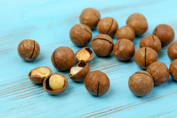 Close up view of natural macadamia nuts. Opens the nut. Selective focus