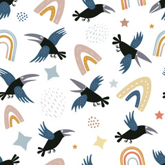 Seamless vector pattern with crows or ravens, rainbows and stars isolated on a white background. Hand drawn print for children.