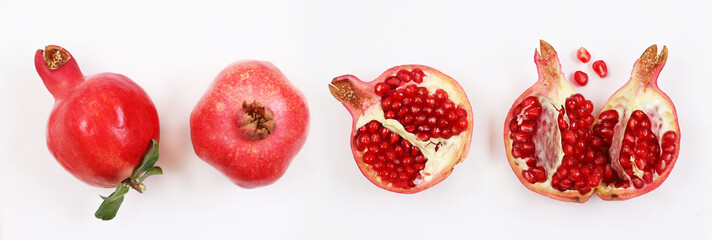 Red pomegranate on a white background. Shallow depth of field