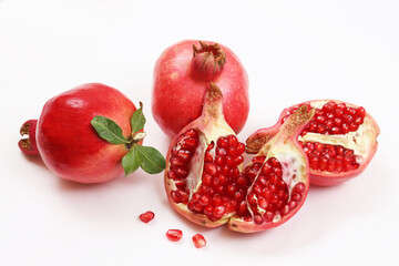 Red pomegranate on a white background. Shallow depth of field