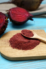 Superfood beetroot flour close-up, energy and help detoxification. Vertical photo