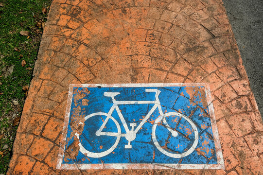 Sign with a bicycle in a reserved bicycle lane in Pekan, Malasia