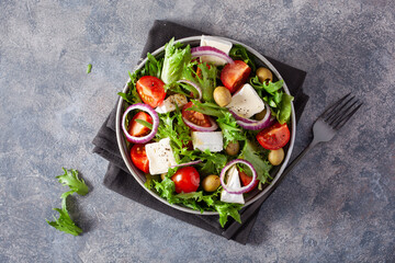 tomato salad with brie cheese olives onion lettuce