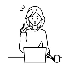 デスクで座ってPCを開いて何かひらめいたリモートワークの女性