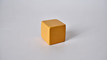 yellow cube on white background