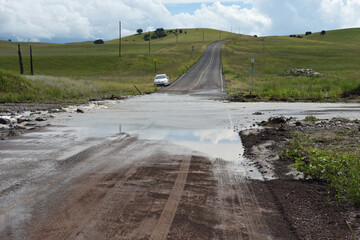 New Mexico Highway near Mule Creek flooded from monsoon rains.