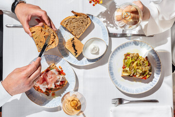 Assorted bruschetta and wine
