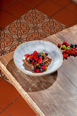 Duck breast with foie gras and berries