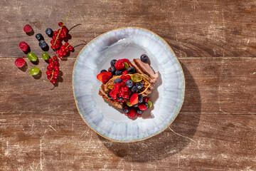 Duck breast with foie gras and berries