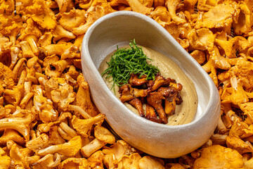 Hummus with fried chanterelle mushrooms.